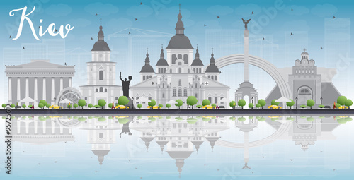 Kiev skyline with grey landmarks, blue sky and reflections