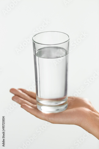 Water Glass. Health And Diet Concept. Woman's Hand Holding Glass. Drinks. Hydration