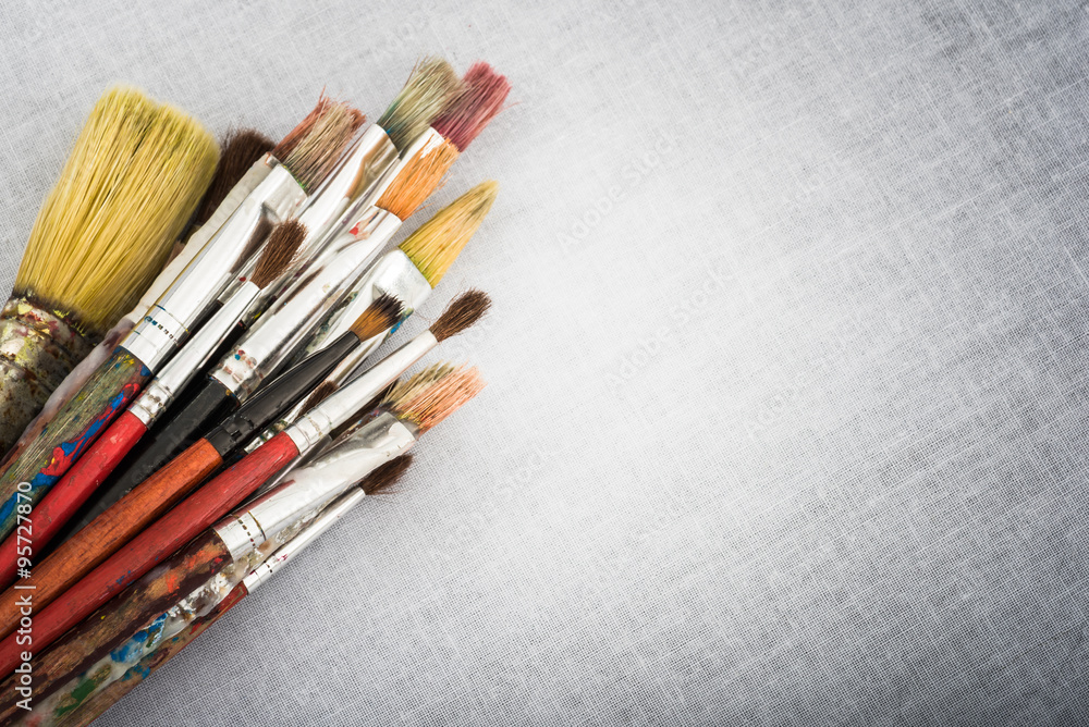 Fototapeta premium Artistic brushes on Canvas