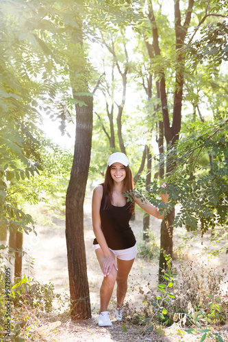 Girl in sportswear for a run outdoors © Sensay
