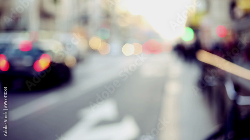 representation of urban context with out of focus and blurred background, traffic and people in citylife photo