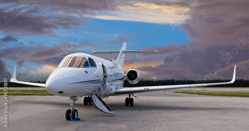 Canvas Print Private jet on the runway with the stair down