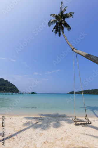 wooden swing board by the beach © maewjpho