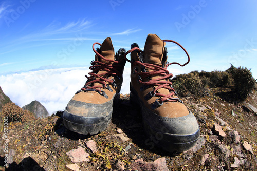 hiking boots on beautiful mountain peak