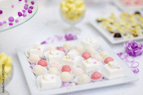 Beautiful desserts, sweets and candy table © MNStudio