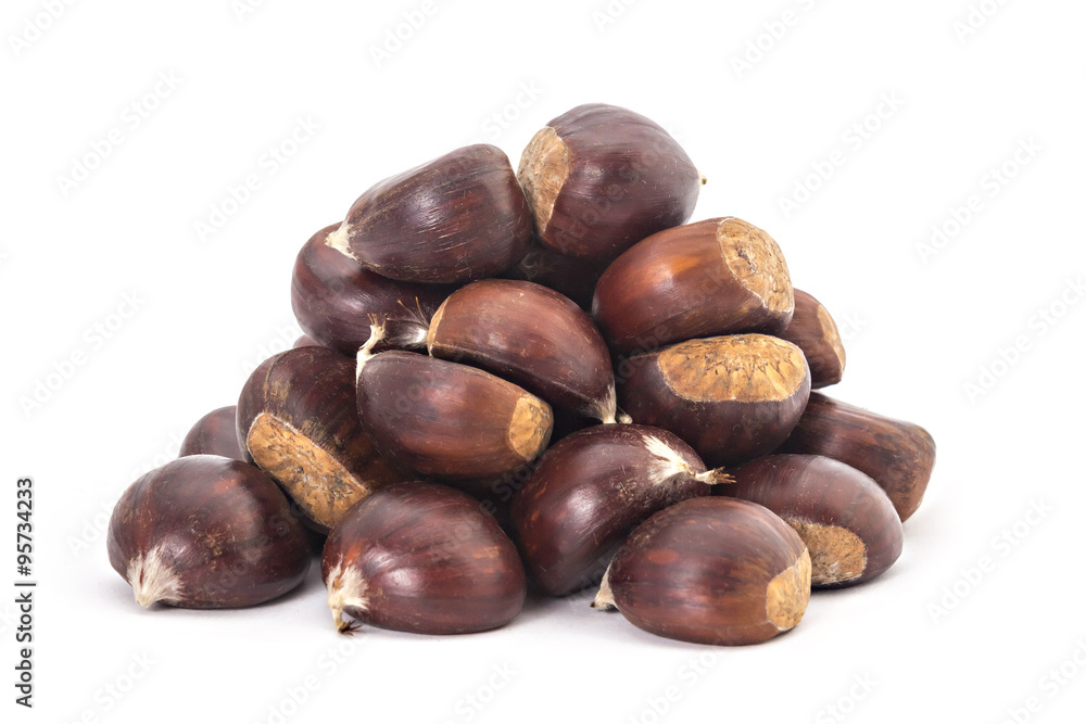 Pile, heap, of fresh organic chestnuts isolated on white background Pile, heap, of fresh organic chestnuts isolated on white background
