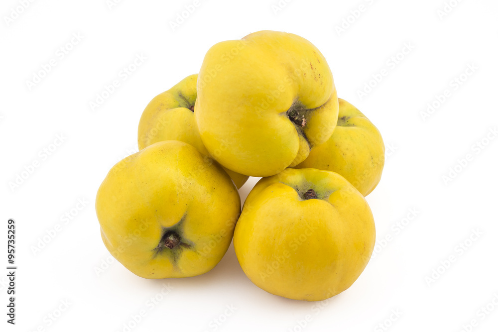 Bunch of fresh ripe yellow quinces isolated on white background