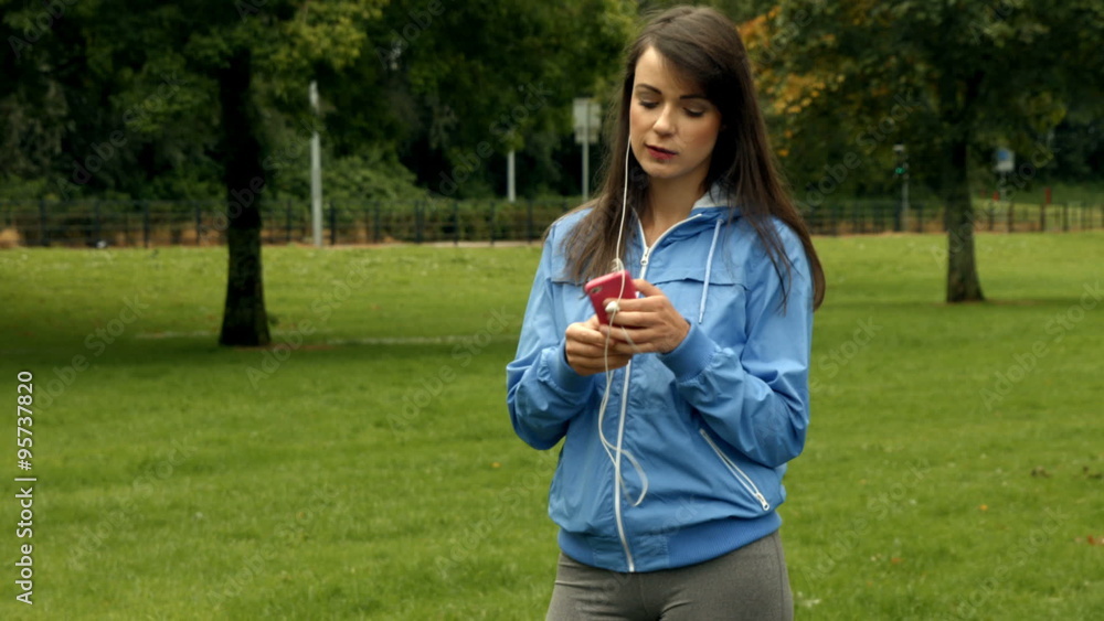 Fit woman wearing headphones Fit woman wearing headphones