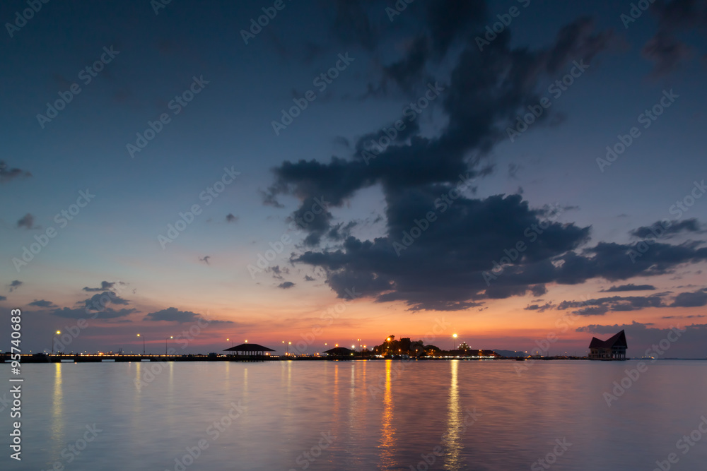 Naklejka premium Landscape of bridge to seaport and sunset
