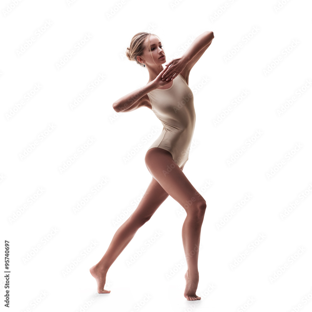 young beautiful dancer in beige swimsuit 