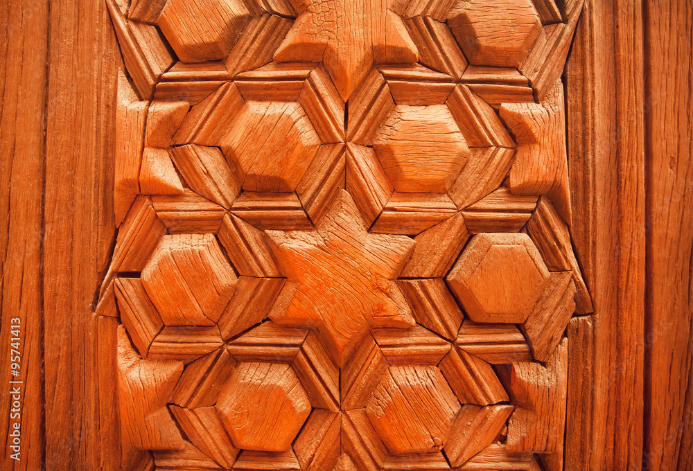 Antique style design with islamic patterns on wooden door Antique style design with islamic patterns on wooden door