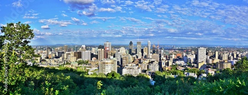 MONTREAL, CANADA -20 AUGUST 2015- Scenic panorama of the city of Montreal in Quebec from the Chalet du Mont Royal (Mount Royal Chalet) belvedere viewpoint.  photo