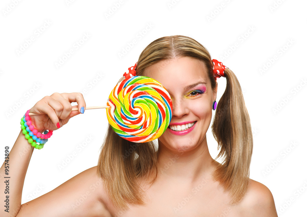 Girl eating colourful lollipop. Lollipop.  Isolated on white background