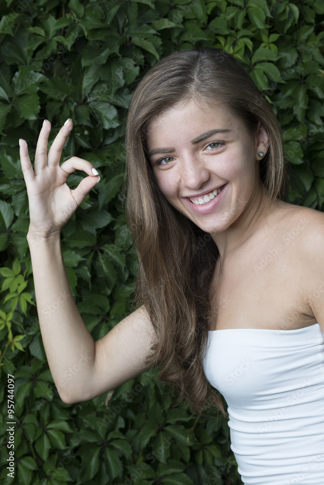 cute girl make sign with her right hand cute girl make sign with her right hand