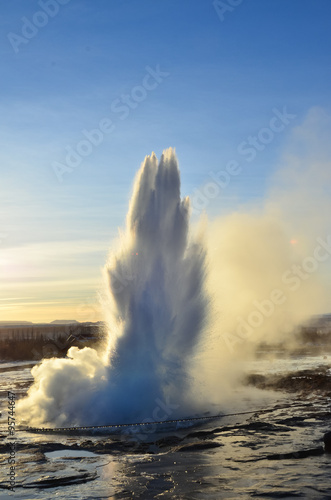 Hot steam erupting from Strokkur fountain geyser located in geothermal area in southwest Iceland east from Reykjavik.