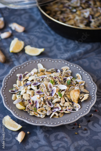 Stir fried clams with roasted paste,garlic, lemon, cilantro