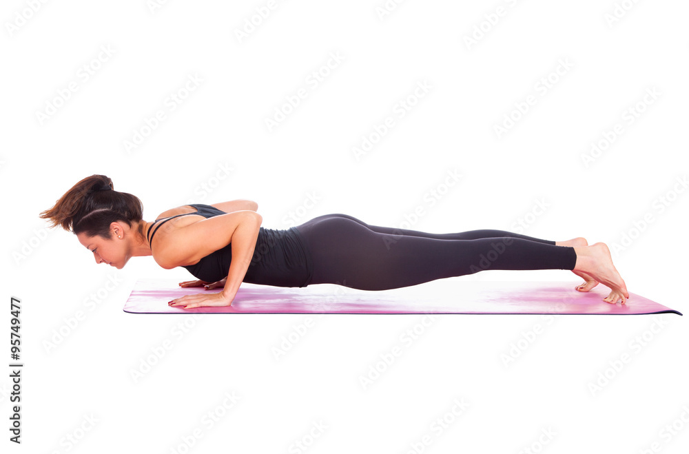 Beautiful woman doing Chaturanga Dandasana pose Beautiful woman doing Chaturanga Dandasana pose