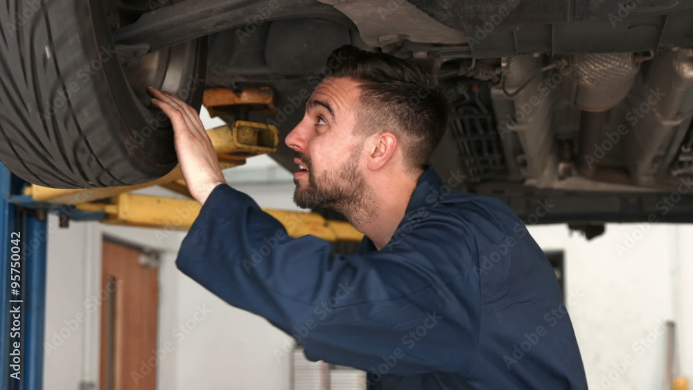 Mechanic working on a tire Mechanic working on a tire