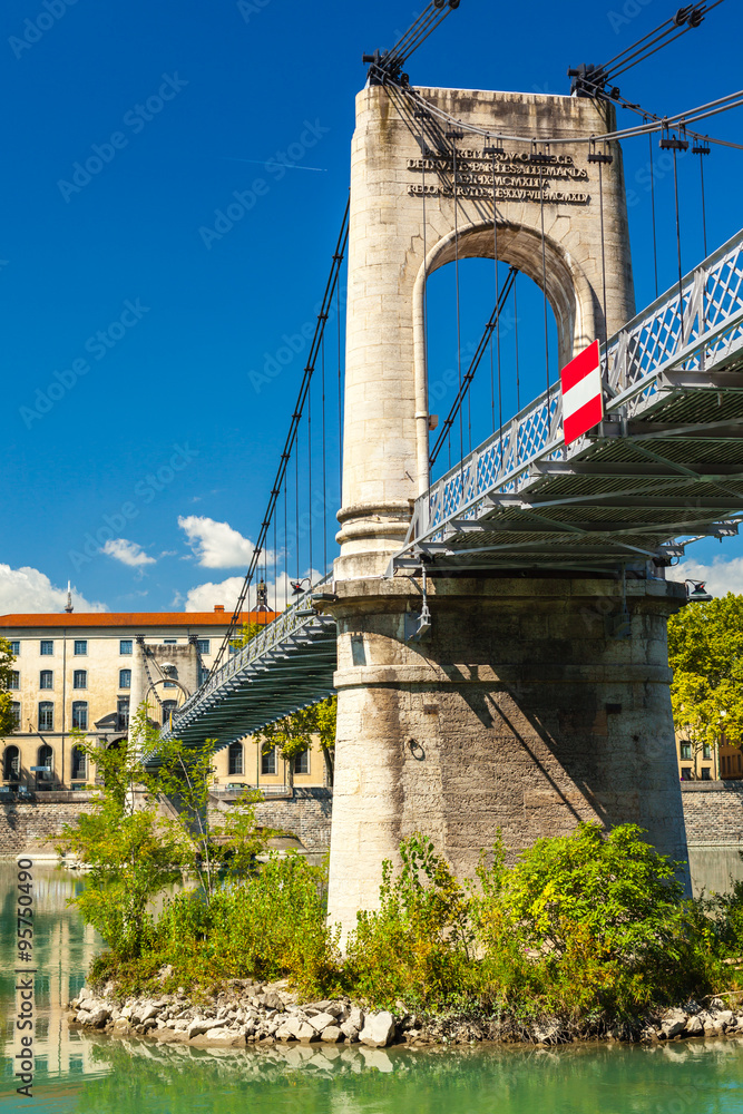 Fototapeta premium Old Passerelle du College bridge over Rhone river in Lyon, Franc