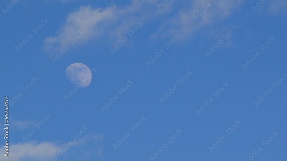 Bright Blue Morning Sky With The Half Moon And Clouds Bright Blue Morning Sky With The Half Moon And Clouds