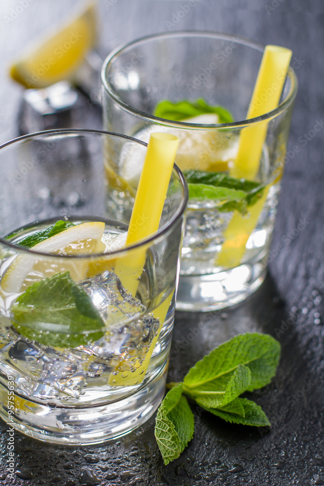 Fototapeta premium Lemonade ingredients on dark stone background
