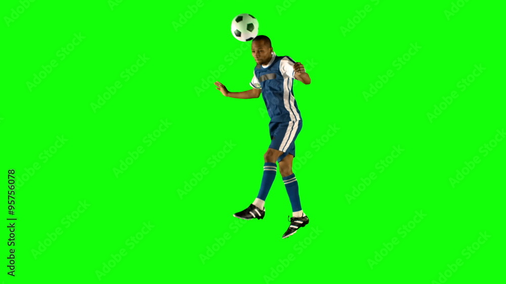 Football player heading the ball Football player heading the ball