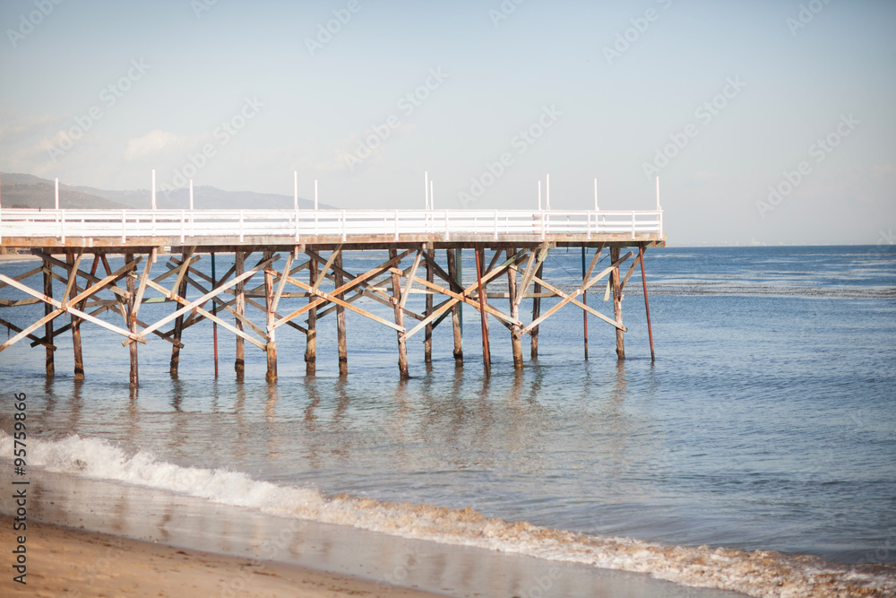 Peaceful view of the Pier, the beach and the ocean in Malibu, Ca