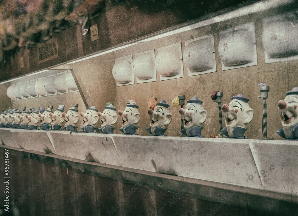 Clown Water Gun Game Vintage. A classic water gun clown balloon