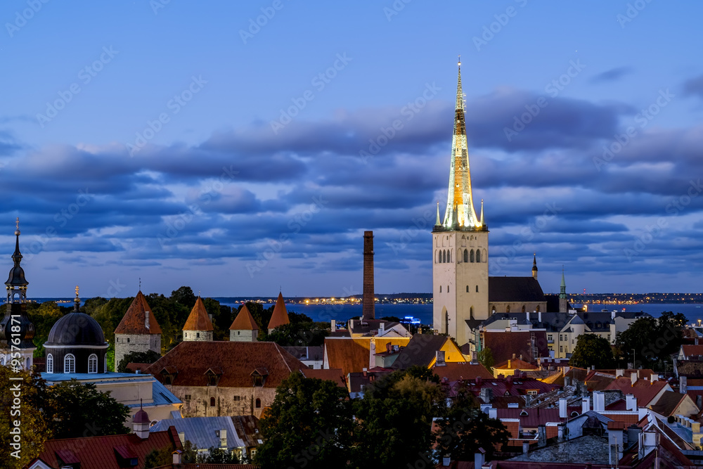 Fototapeta premium View of the St. Olaf Cathedral in old Tallinn at sunset . Eston