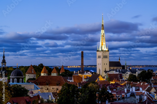 View of the St. Olaf Cathedral in old Tallinn at sunset . Eston