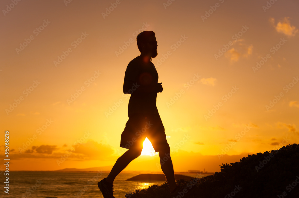 Silhouette of young man running
