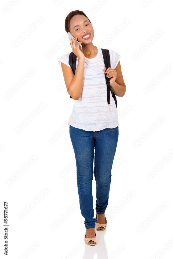 afro american college girl talking on mobile phone afro american college girl talking on mobile phone