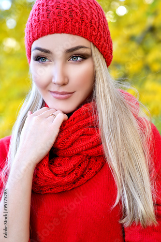 Beautiful young woman in autumn day 