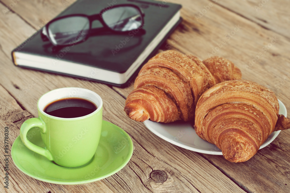 Greens cup of espresso coffee with croissants Greens cup of espresso coffee with croissants