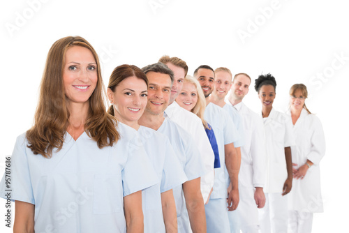 Portrait Of Smiling Medical Team Standing In Line