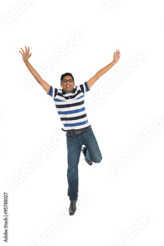 indian male jumping in joy