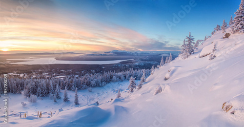 Winter landscape in mountains at the sunrise