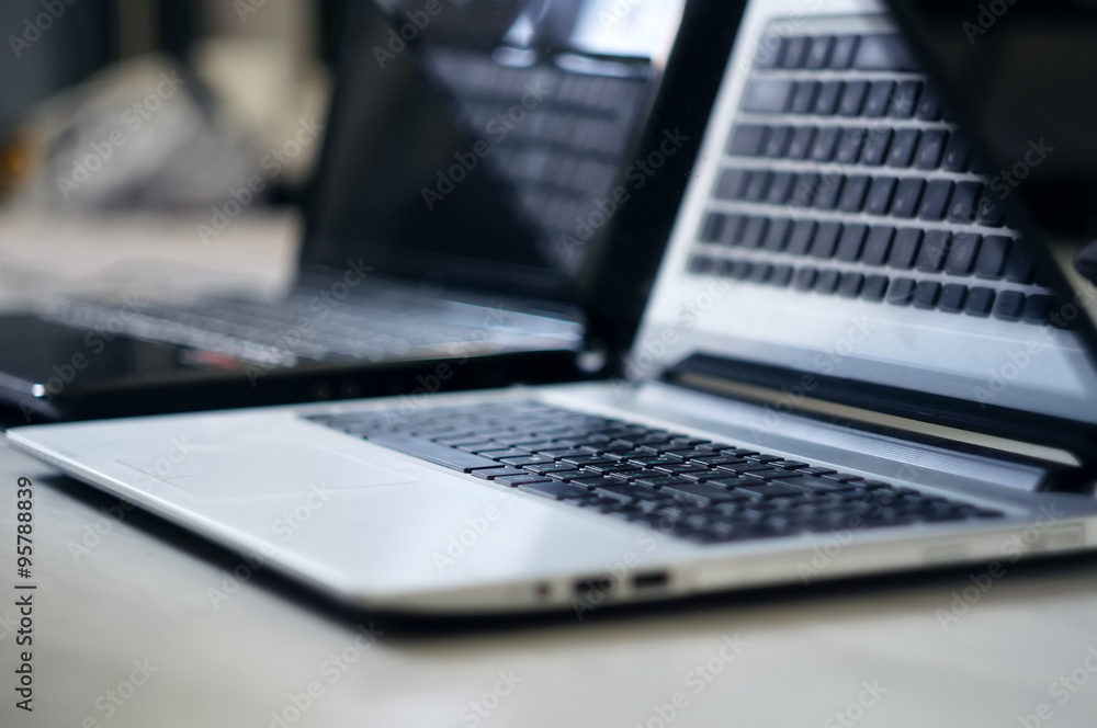 Blured laptop with focus on keyboard Blured laptop with focus on keyboard