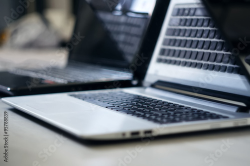 Blured laptop with focus on keyboard