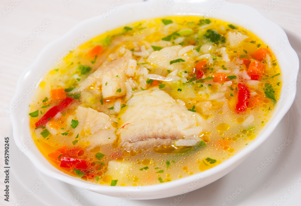 Fish soup with vegetables and rice