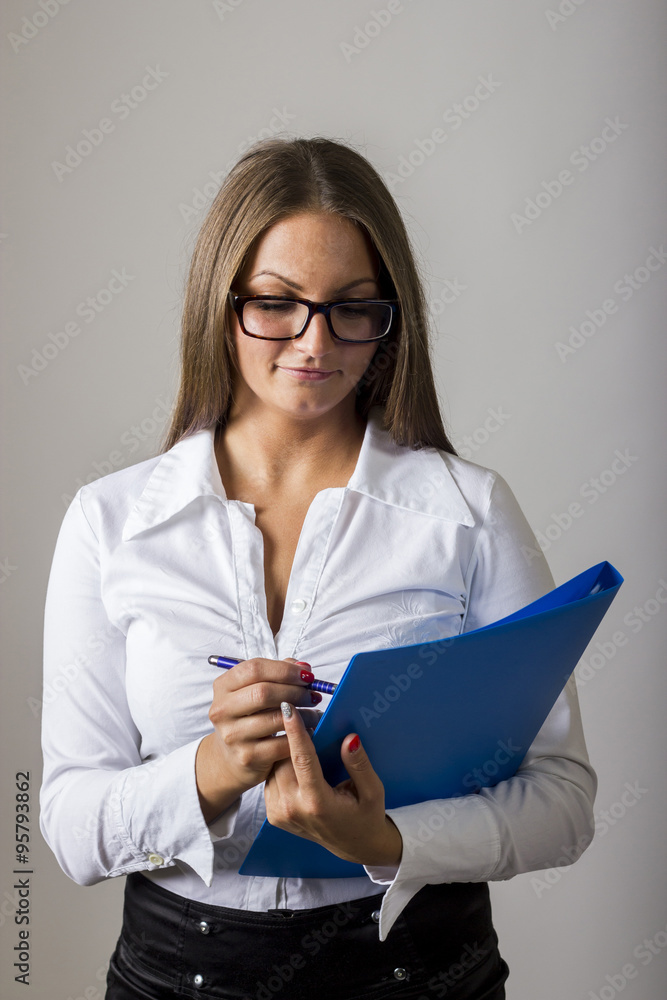 Beautiful girl holding blue folder