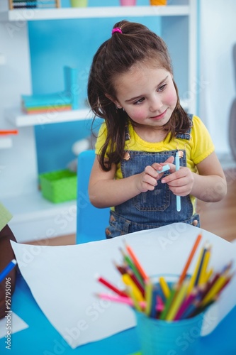 Happy kids enjoying arts and crafts together photo