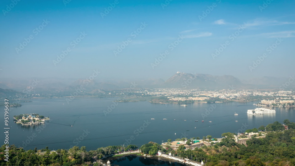 Timelapse of aerial view of Lake Pichola with Lake Palace (Jag Niwas) and Jag Mandir (Lake Garden Palace). Udaipur, Rajasthan, India Timelapse of aerial view of Lake Pichola with Lake Palace (Jag Niwas) and Jag Mandir (Lake Garden Palace). Udaipur, Rajasthan, India
