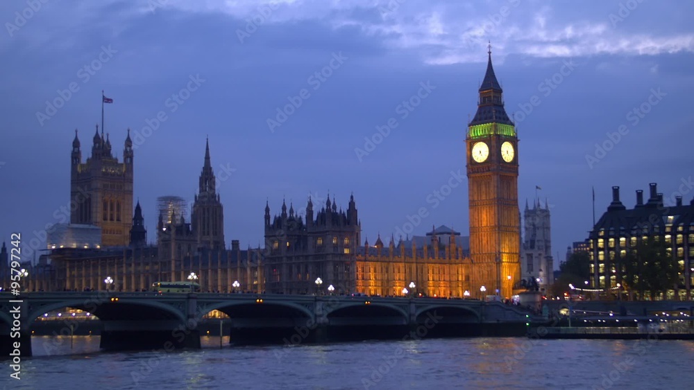 View of the House of Parliament and the Big Ben in London after sunset, at dusk with artificial illumination View of the House of Parliament and the Big Ben in London after sunset, at dusk with artificial illumination