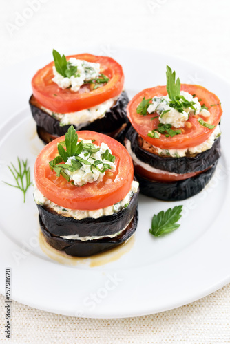 Eggplant, tomato and curd cheese stacks