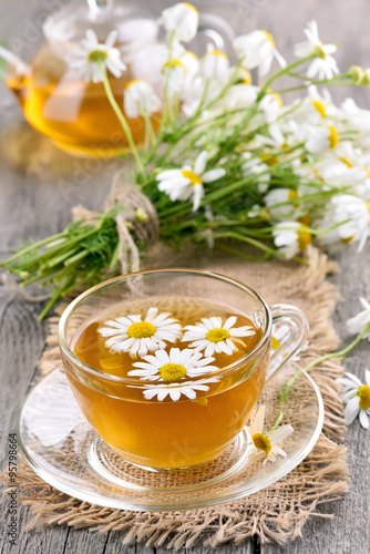 Herbal chamomile tea in glass cup