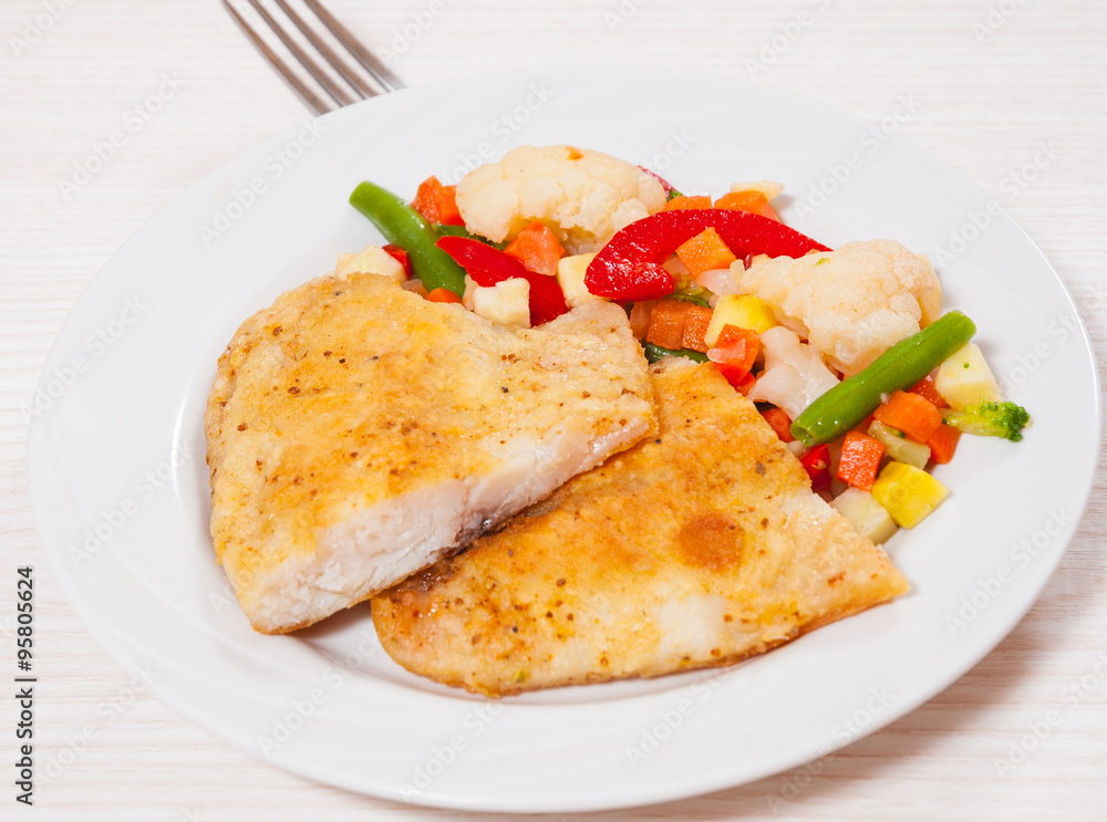 Fried fish fillet and Mixed vegetables Fried fish fillet and Mixed vegetables