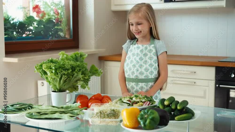 Girl chef promoting healthy food. Thumbs up. Ok Girl chef promoting healthy food. Thumbs up. Ok