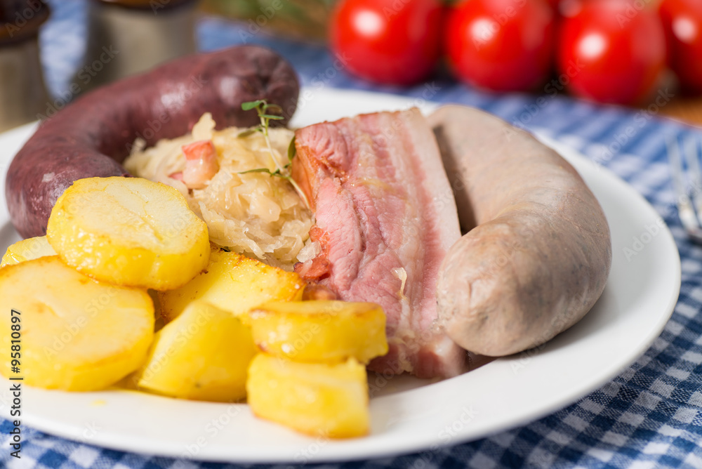 Schlachtplatte mit Sauerkraut und Wurst Stock Photo | Adobe Stock Schlachtplatte mit Sauerkraut und Wurst Stock Photo | Adobe Stock