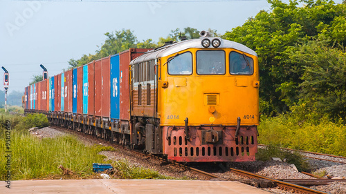 Container freight train was passing through station, 2015.